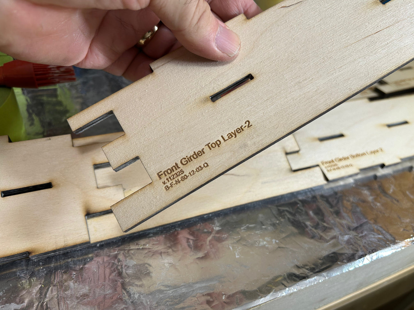 Beam members join end to end using a proprietary interlocking joint.