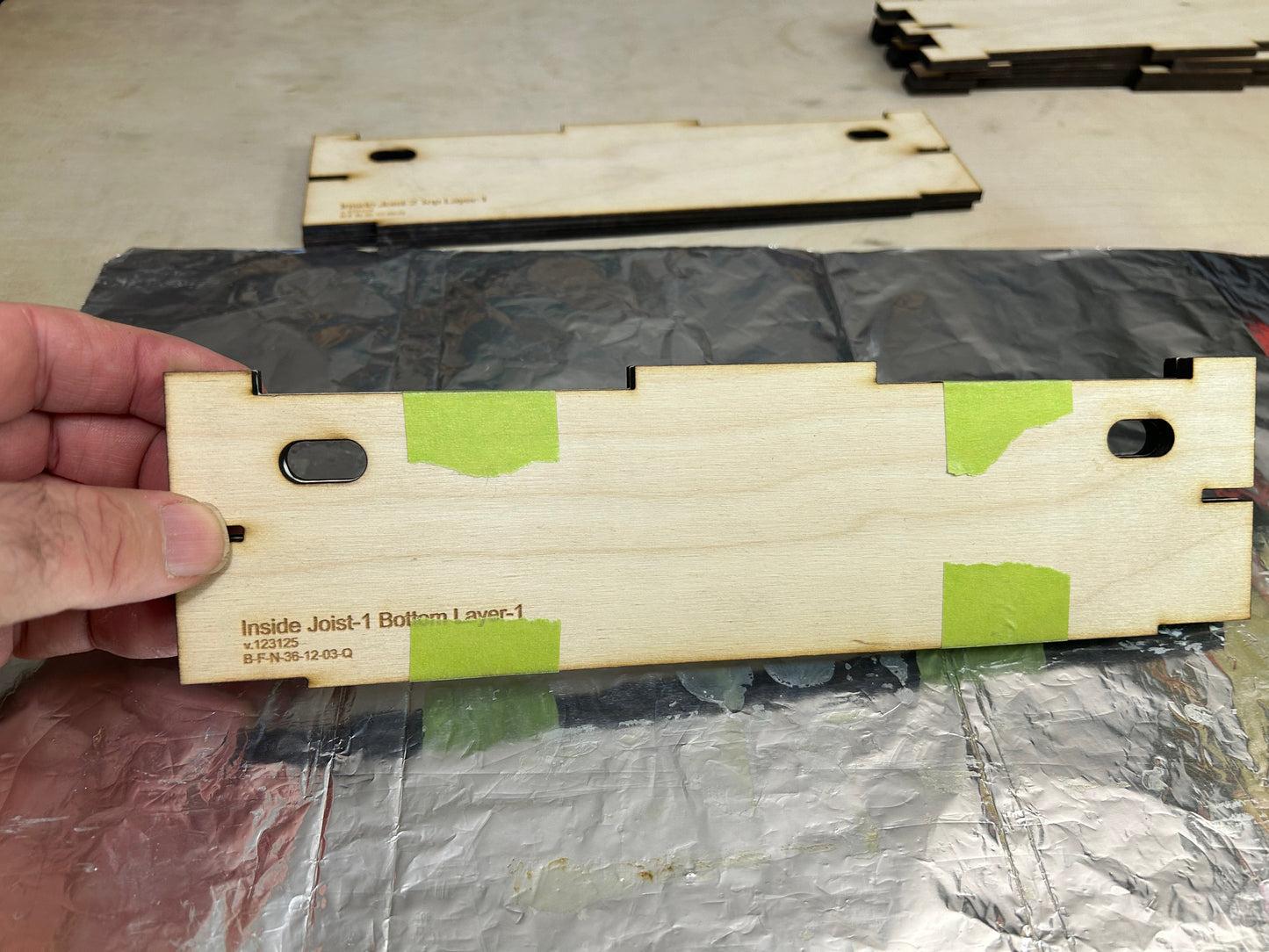 Laminating end joist members to make strong joists.